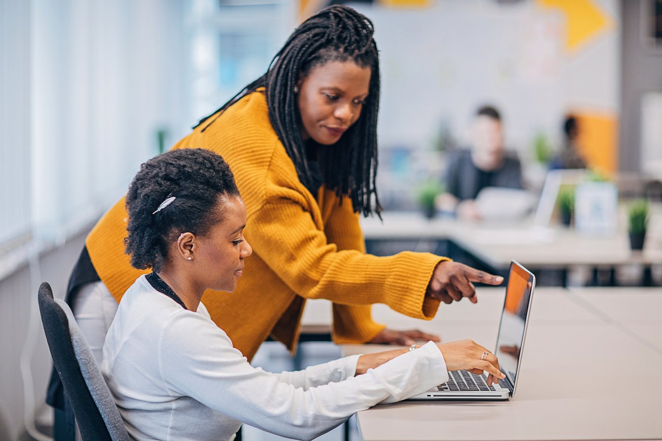 Two Women Working Together in the Office